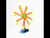 DIY Ferris Wheel Model fully assembled and spinning on a table.