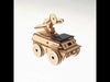 Solar 3D Puzzle Radar Vehicle Model Kit – wooden DIY STEM toy with solar-powered motor and radar dish, demonstrating renewable energy in motion.
